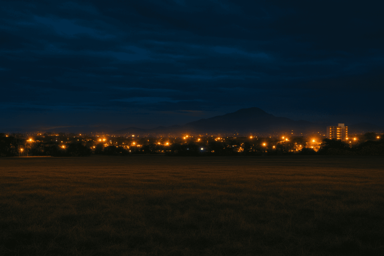 Split-scene banner with Japanese engineers and a Philippine rooftop solar installation